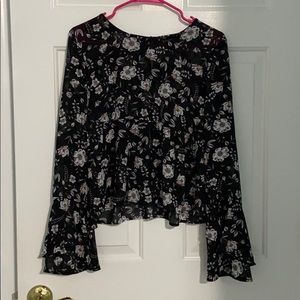 Beautiful black floral blouse with ruffled arms!